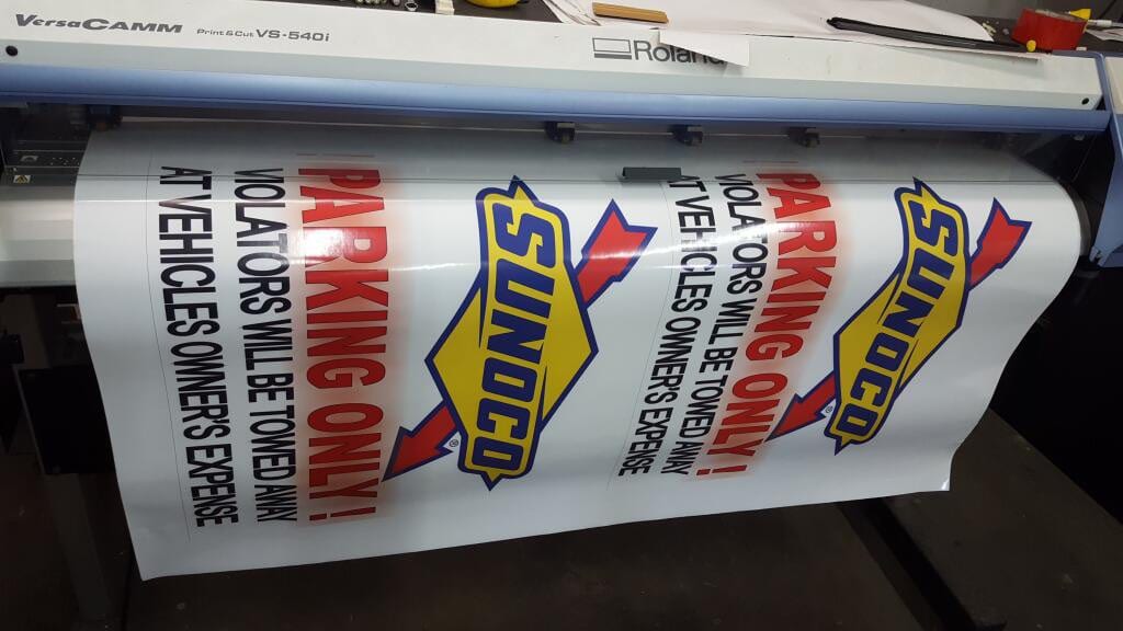 Sunoco parking-only decals printing on a Roland VersaCAMM wide-format printer