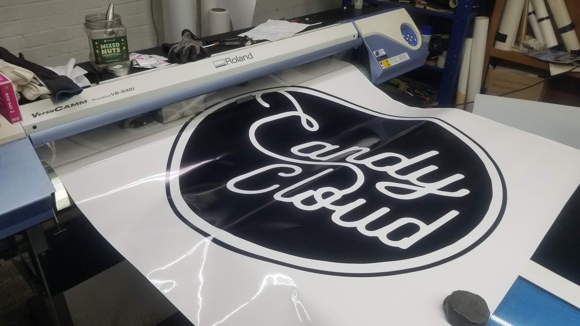 Candy Cloud logo decal printed on a Roland print-and-cut machine in the shop