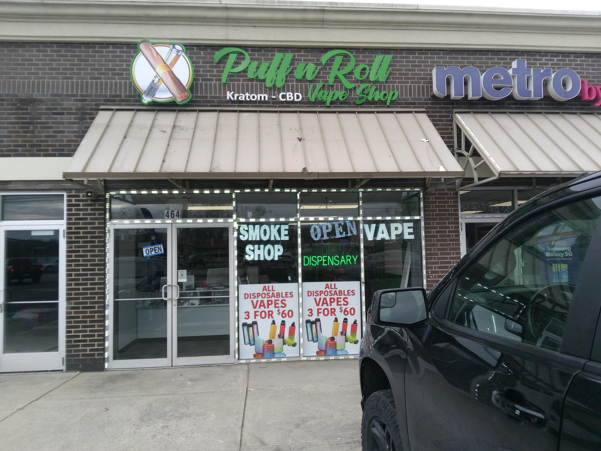 Puff n Roll Vape Shop dimensional letters and logo mounted above the storefront